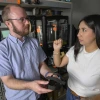 Student explains adaptive foot pedal prototype to professor in Health Sciences Design makerspace